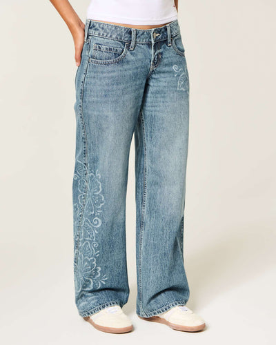 Ultra Low-Rise Medium Wash Floral Print Baggy Jeans